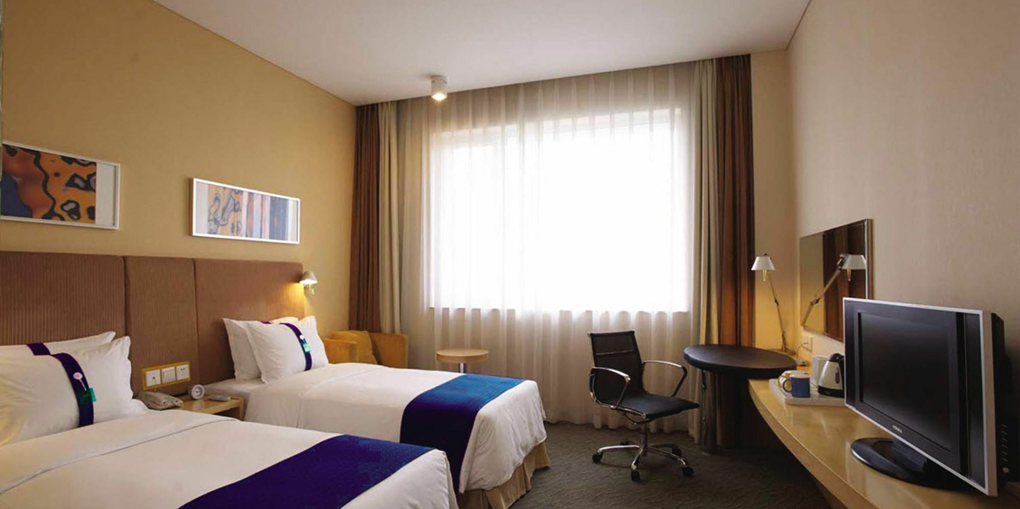 Holiday Inn Express Leshan City Square By Ihg High Speed Rail And Leshan Giant Buddha Exterior photo